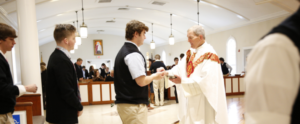 students receiving communion
